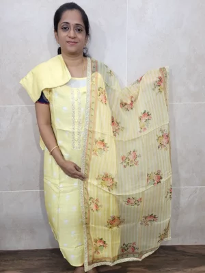 Printed pure muslin silk top paired with a digital printed organza dupatta and cotton silk bottom